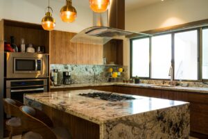 Lee más sobre el artículo TENDENCIAS EN CUBIERTAS DE COCINA 2026: GRANITO O CUARCITA